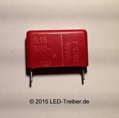 roter Kondensator auf weißem Papier, 2W-LED-Lampe